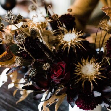 Dark colored dried flowers used asHalloween Decor