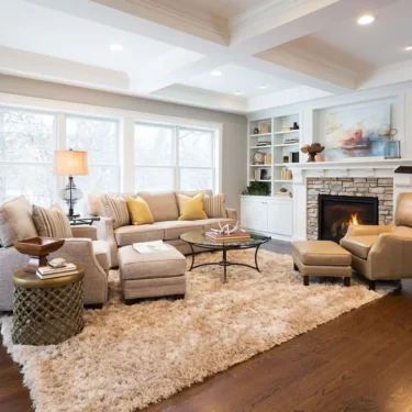 Neutral color living room with sofa and chairs