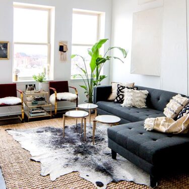 Living room with layered rugs
