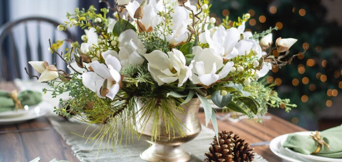 Holiday centerpiece of white flowers
