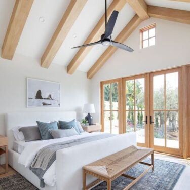 Bedroom with energy efficient ceiling fan