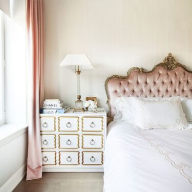 Romantic bedroom with tufted headboard