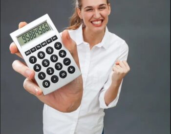 Excited lady holding calculator