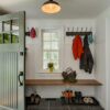 Mudroom with bench and hooks for coats