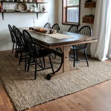 Dining table on rug with room for chairs to pull out