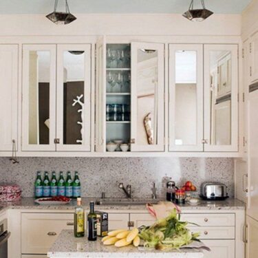 Kitchen cabinets with mirrored doors