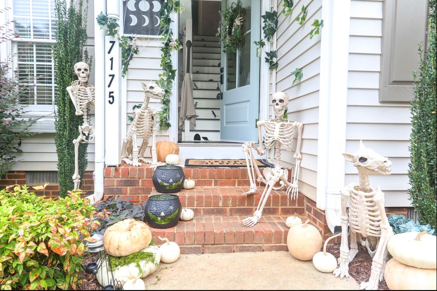 Spooky Halloween porch with skeletons